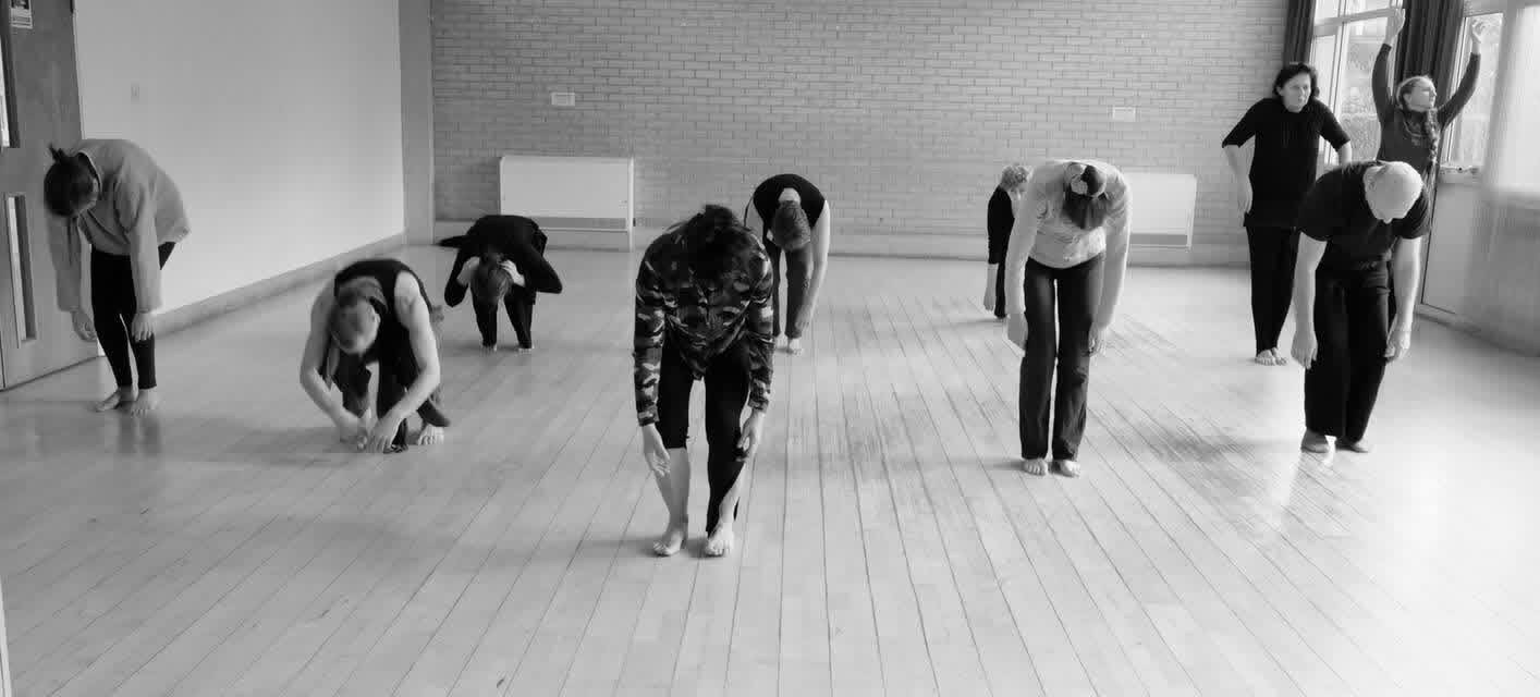 Participants in creative movement — shared exploration in the studio