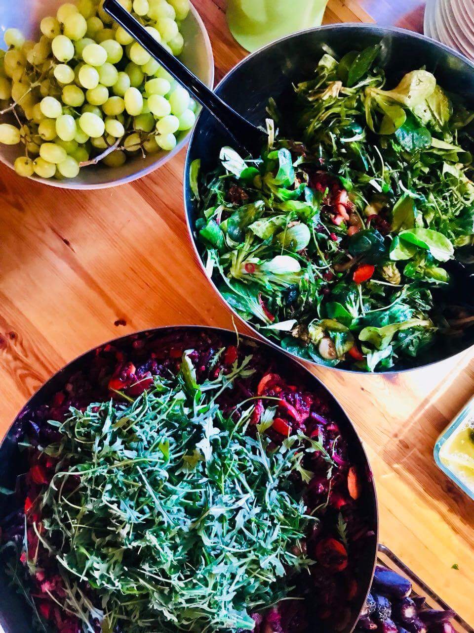 Fresh salads, fruit, and shared brunch dishes